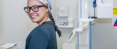 Staff member smiles at Charleston Oral and Facial Surgery.